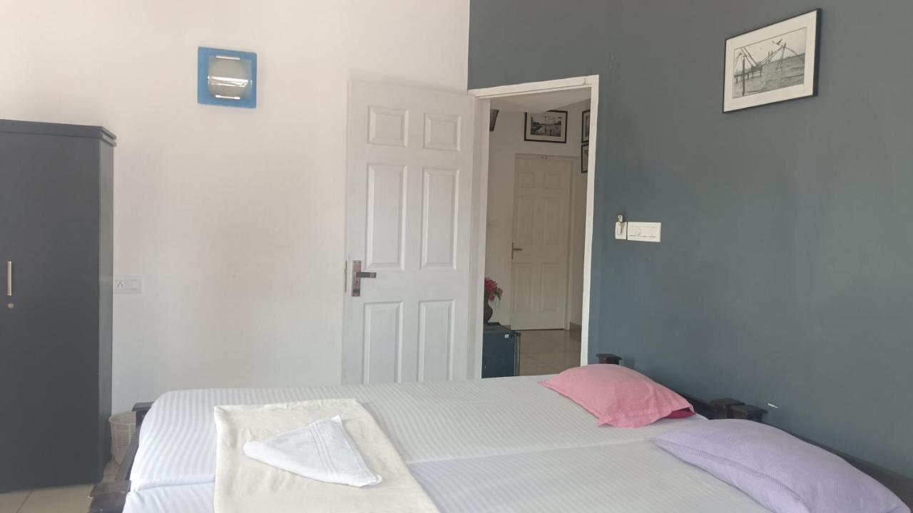 Nest Apartment Kochi Стая снимка